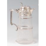 A Victorian glass and silver topped claret jug, of conical form,