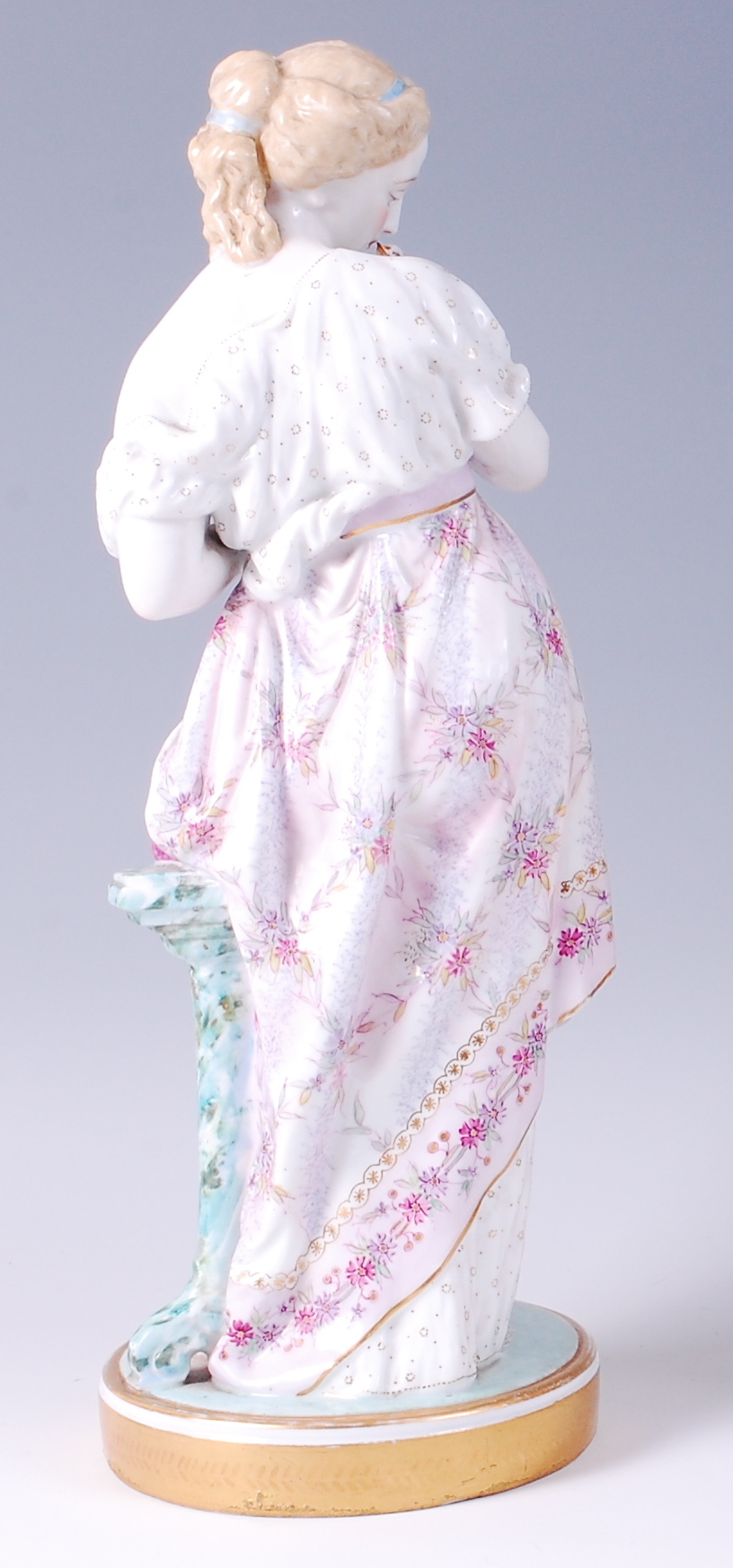 A circa 1900 Meissen Dresden porcelain figurine, of a maiden cradling a dove, - Image 2 of 3