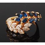 An 18ct gold, sapphire and diamond cocktail ring,
