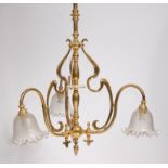 An Art Nouveau lacquered brass three light ceiling pendant,