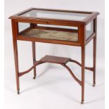 An Edwardian inlaid mahogany bijouterie table,