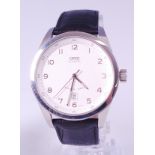 An Oris gents steel cased automatic wristwatch, having signed silvered dial, Arabic numerals,