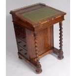 A Regency rosewood writing Davenport, having a gilt tooled leather inset writing surface,