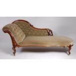 *A Victorian walnut framed scroll-end chaise-longue,