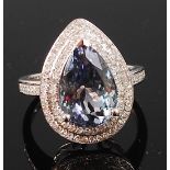 A contemporary 14ct white gold, tanzanite and diamond ring,