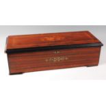 A circa 1900 Swiss rosewood cased music box, the 11" cylinder playing eight airs,
