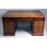 A late Victorian mahogany partners pedestal desk,