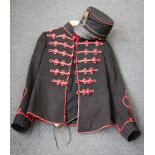 An early 20th century Continental dress uniform to include a black felt kepis with applied badge and