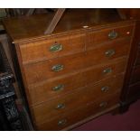 An early 19th century oak squarefront chest of two short over four long drawers, w.