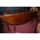 A 19th century mahogany small wake table having a gateleg action,