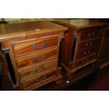 A pair of Eastern hardwood four drawer bedside chests, each in the French Empire taste, w.