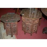 An Indian low relief carved and pierced teak octagonal folding occasional table,