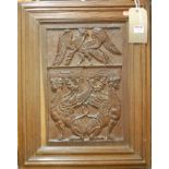 An early 20th century continental low relief carved oak rectangular wall panel,