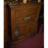 An early 20th century pitched pine single door hinge top lead lined cold storage cupboard,