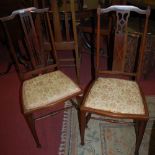 Two Edwardian mahogany and boxwood strung bedroom chairs;