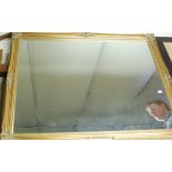 A modern gilt framed rectangular wall mirror of good size,