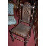 A pair of 1930s barleytwist oak and cane inset dining chairs