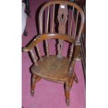 A childs elm seat and beech Windsor chair;