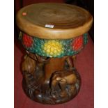 A contemporary Indian carved teak stool,