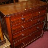 A Victorian mahogany round cornered chest of two short over three long drawers