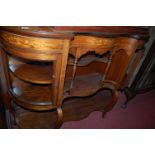 An Edwardian rosewood floral satinwood and bone inlaid side cabinet of serpentine shaped form