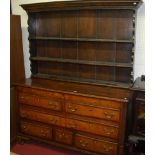 A provincial 18th century and later oak and mahogany crossbanded dresser, w.