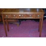 A Georgian style walnut five drawer hall table, having crossbanded top,