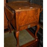 A 1930s figured walnut small dropflap single drawer work table