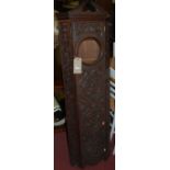 A low relief carved walnut wall mounted corner clock case (only)