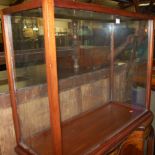 A contemporary hardwood and glazed display case,
