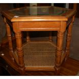 A reproduction hexagonal glass topped two tier occasional table,