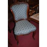 A set of six 19th century French walnut salon side chairs,