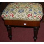 A Victorian rosewood and walnut piano stool, having rise-and-fall action,