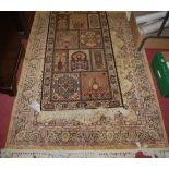 A Persian style woollen rug,