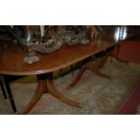 A Regency style mahogany triple pillar dining table, max.