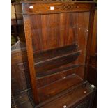 A 1930s oak freestanding open bookshelf,