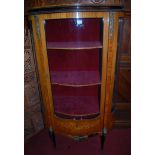 A circa 1900 French kingwood vitrine, having velvet lined interior with plate glass shelves,