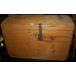 A pine and metal bound dome-top tool chest, having iron end carry handles, w.