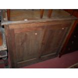 An early 20th century oak double door side cupboard (formerly with upper section) width 110cm