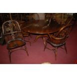 A contemporary oak circular pedestal dining table, dia.