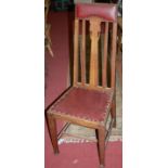 A set of six early 20th century oak slatback dining chairs,