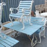 A painted cast metal ended and teak slatted rectangular garden table,