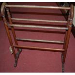 A late Victorian mahogany towel rail