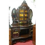 A circa 1900 mahogany Chippendale Revival mirrorback side cabinet,