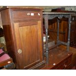 An Edwardian walnut single door bedside cupboard having single upper drawer,
