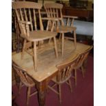 A Victorian pine round cornered farmhouse kitchen table,