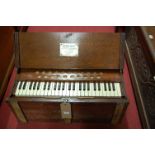 An oak cased portable Bilhorn telescope organ retailed by John Bateman of London