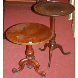 A Victorian walnut circular low pedestal occasional table;