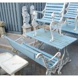 A painted cast metal ended and teak slatted rectangular garden table,