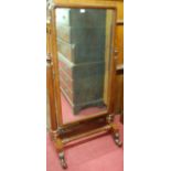 A Victorian flame mahogany cheval mirror, the rectangular plate within turned supports,